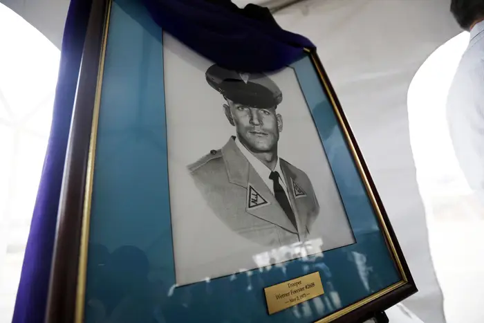 A portrait of New Jersey State Police trooper Werner Foerster is displayed during a Nov. 18, 2015 event unveiling a monument in his honor, in East Brunswick, N.J.